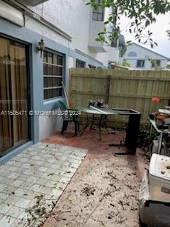 11861 Southwest 18th Street, Unit 329 Miami, FL 33175 - Photo 22 of 23 a room with storage and utility room