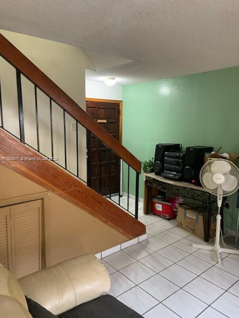 11861 Southwest 18th Street, Unit 329 Miami, FL 33175 - Photo 6 of 23 a view of entryway and hall with wooden floor