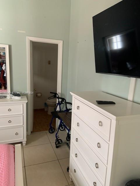 11861 Southwest 18th Street, Unit 329 Miami, FL 33175 - Photo 9 of 23 a bathroom with a sink toilet and mirror
