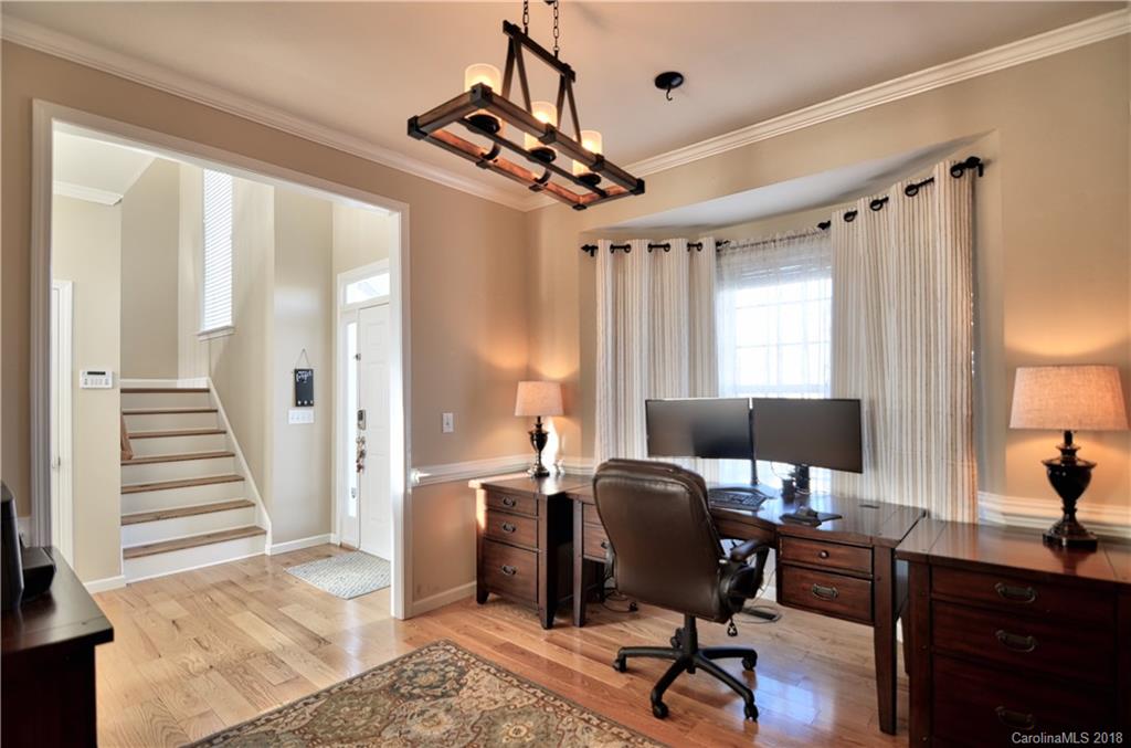 10435 Blackstock Road Huntersville, NC 28078 - Photo 2 of 33 a view of a livingroom with workspace and a window