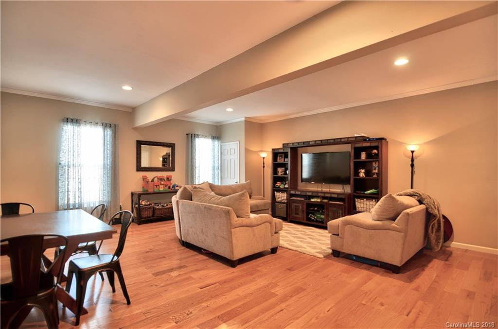 10435 Blackstock Road Huntersville, NC 28078 - Photo 15 of 33 a living room with furniture and a flat screen tv