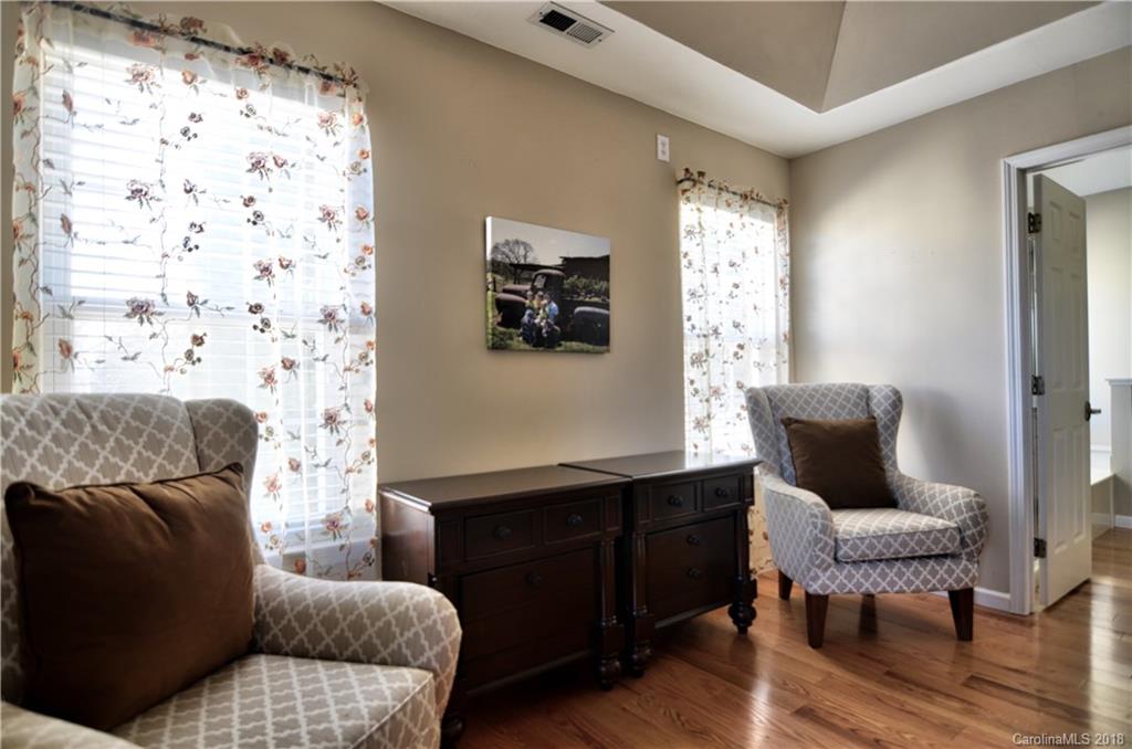 10435 Blackstock Road Huntersville, NC 28078 - Photo 22 of 33 a living room with furniture and wooden floor