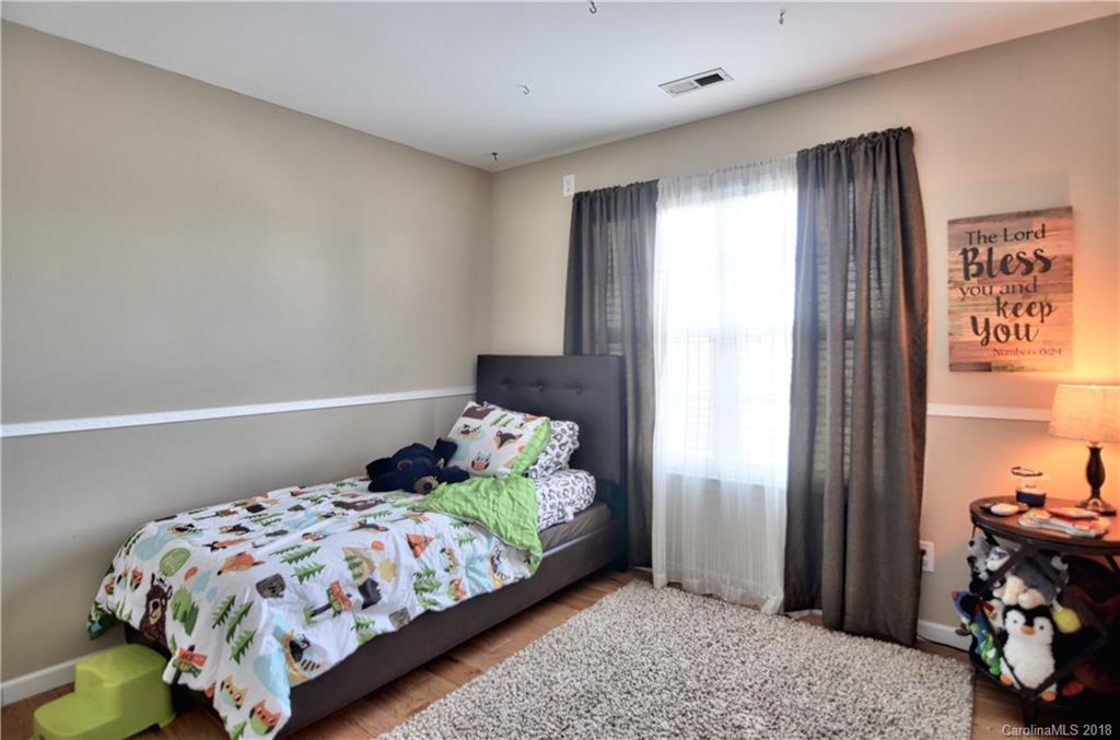 10435 Blackstock Road Huntersville, NC 28078 - Photo 25 of 33 a bedroom with a bed and a window
