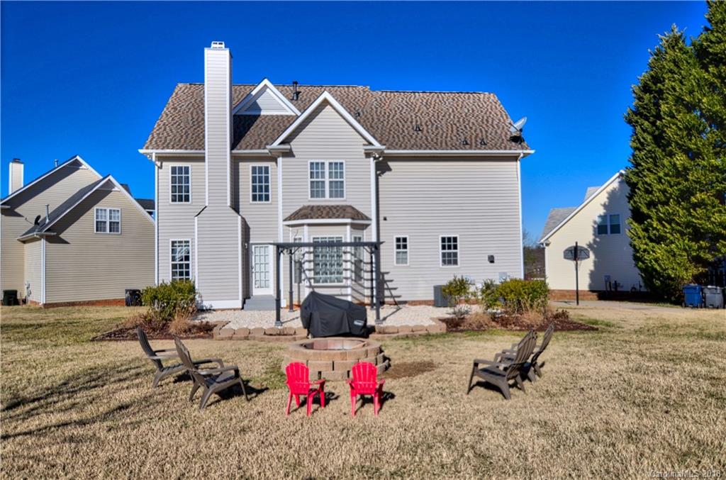10435 Blackstock Road Huntersville, NC 28078 - Photo 29 of 33 a view of a house with backyard