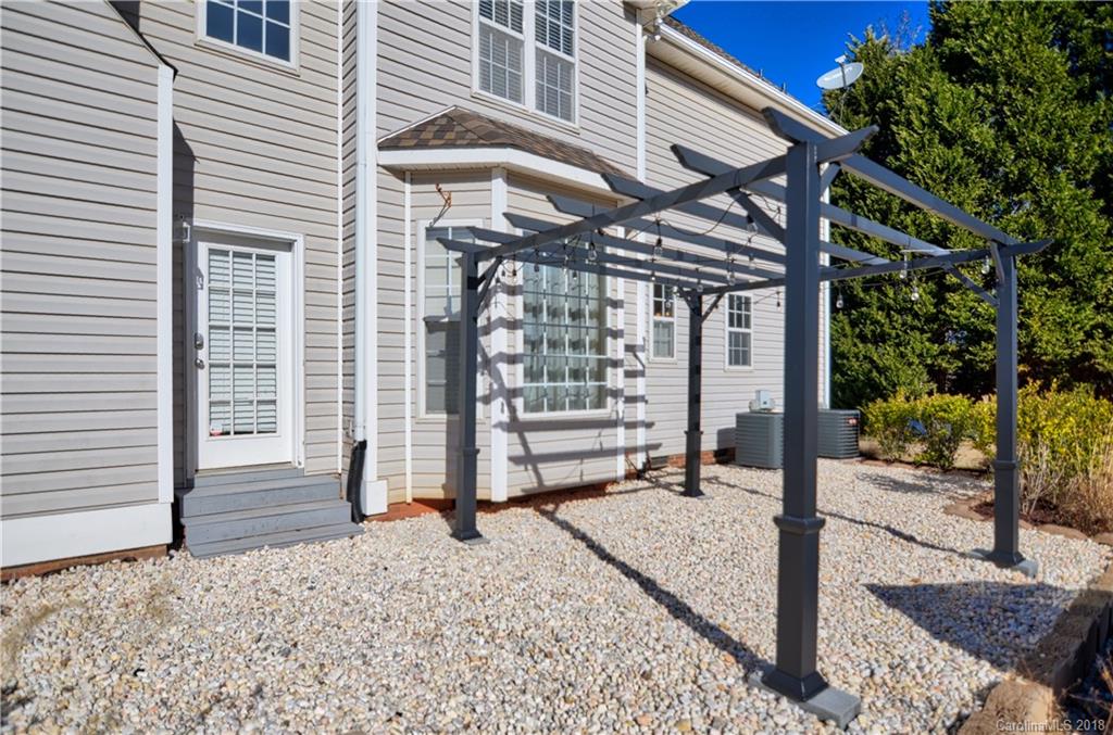 10435 Blackstock Road Huntersville, NC 28078 - Photo 32 of 33 a view of a house with a door