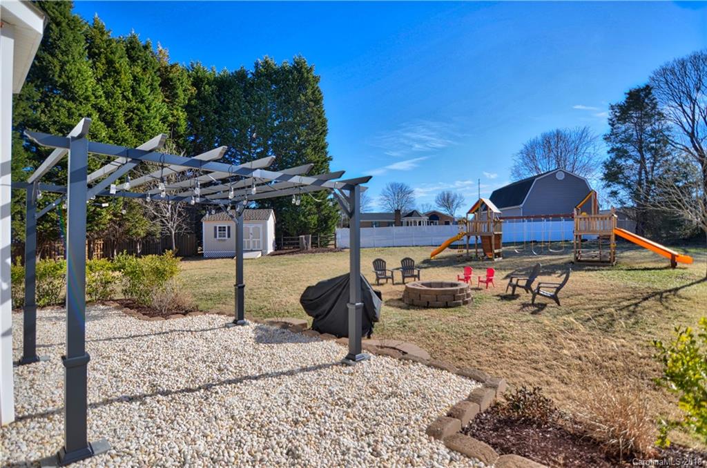 10435 Blackstock Road Huntersville, NC 28078 - Photo 33 of 33 a house view with a garden space
