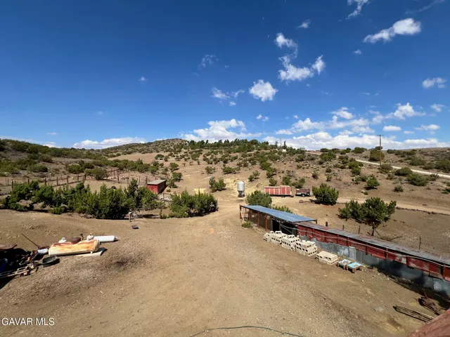 a view of house with outdoor space and street view