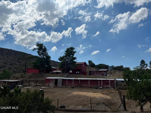 a view of house with outdoor space