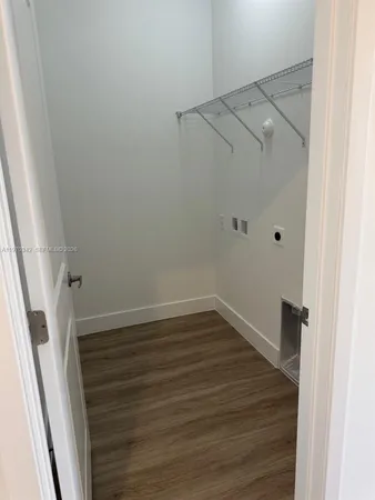 a view of an empty walk in closet