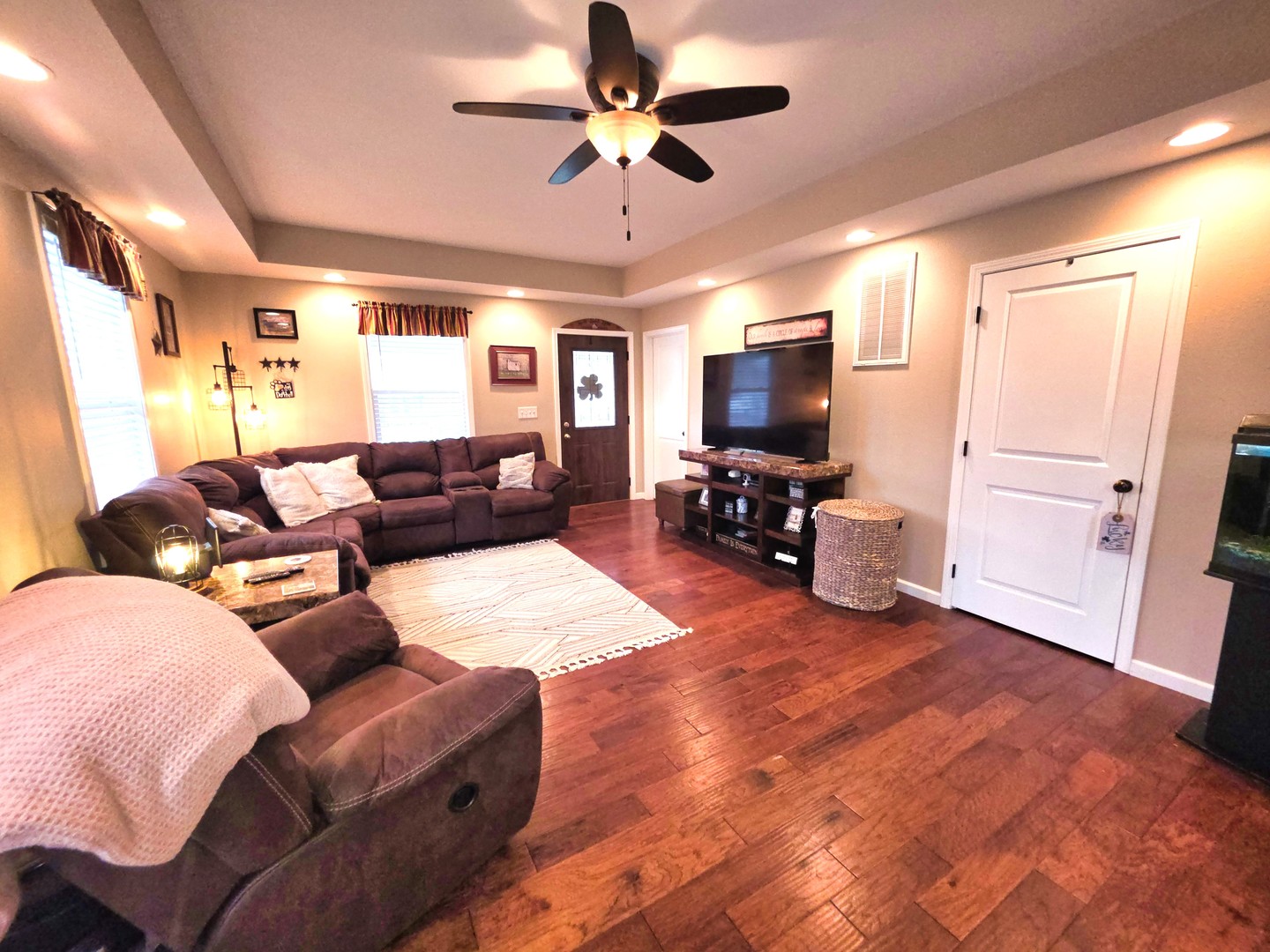 127 Flora Avenue Flora, IL 62839 - Photo 2 of 88 a living room with furniture and a flat screen tv