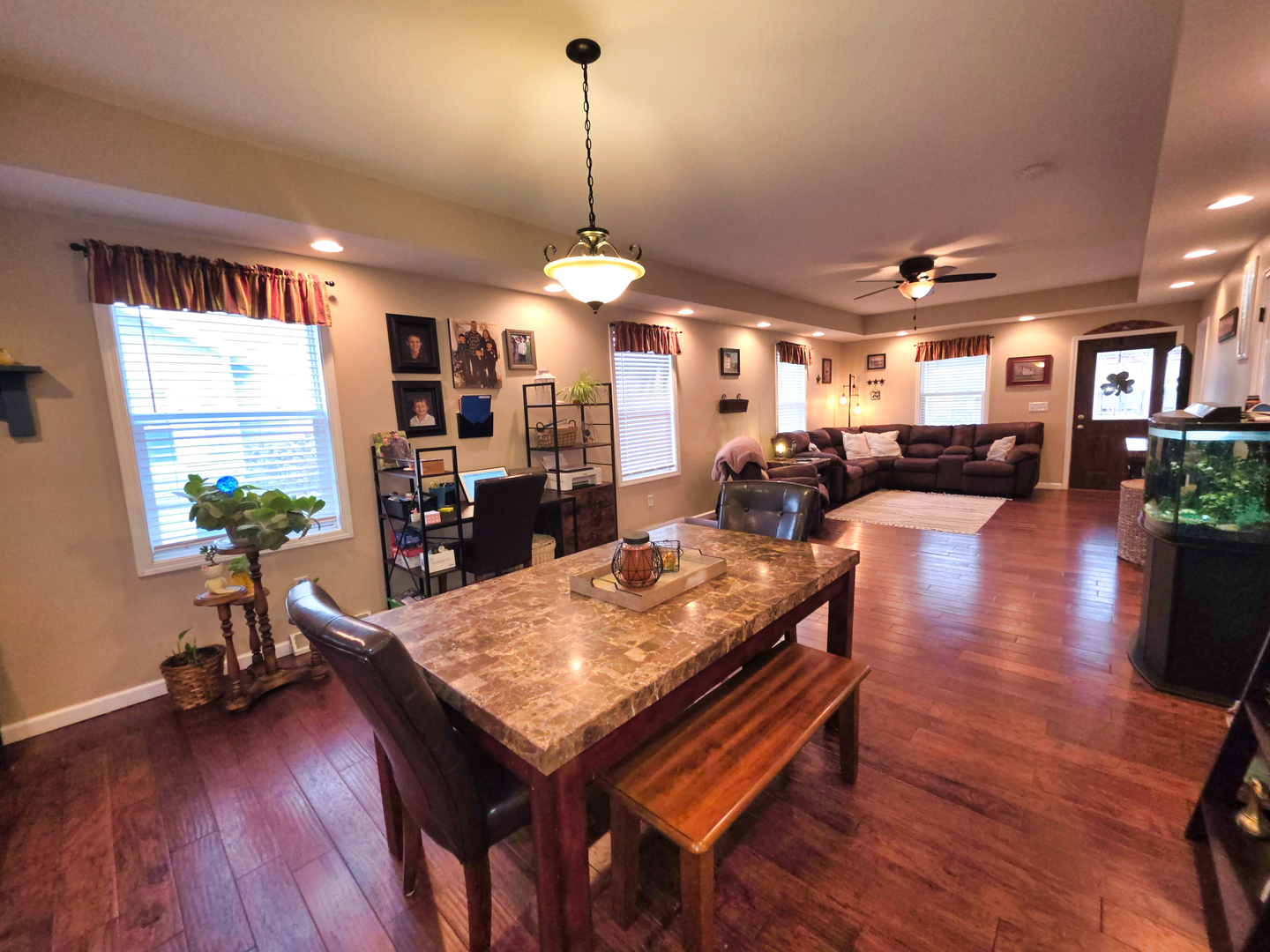 127 Flora Avenue Flora, IL 62839 - Photo 22 of 88 a view of a dining room with furniture window and wooden floor
