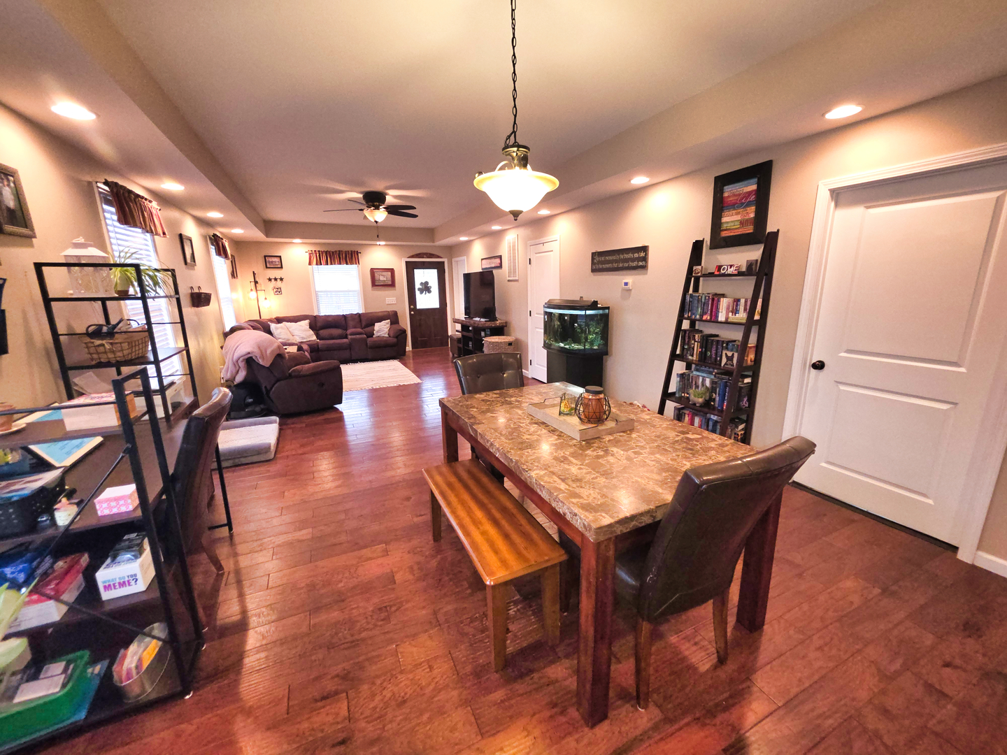 127 Flora Avenue Flora, IL 62839 - Photo 29 of 88 a view of a dining room with furniture and wooden floor