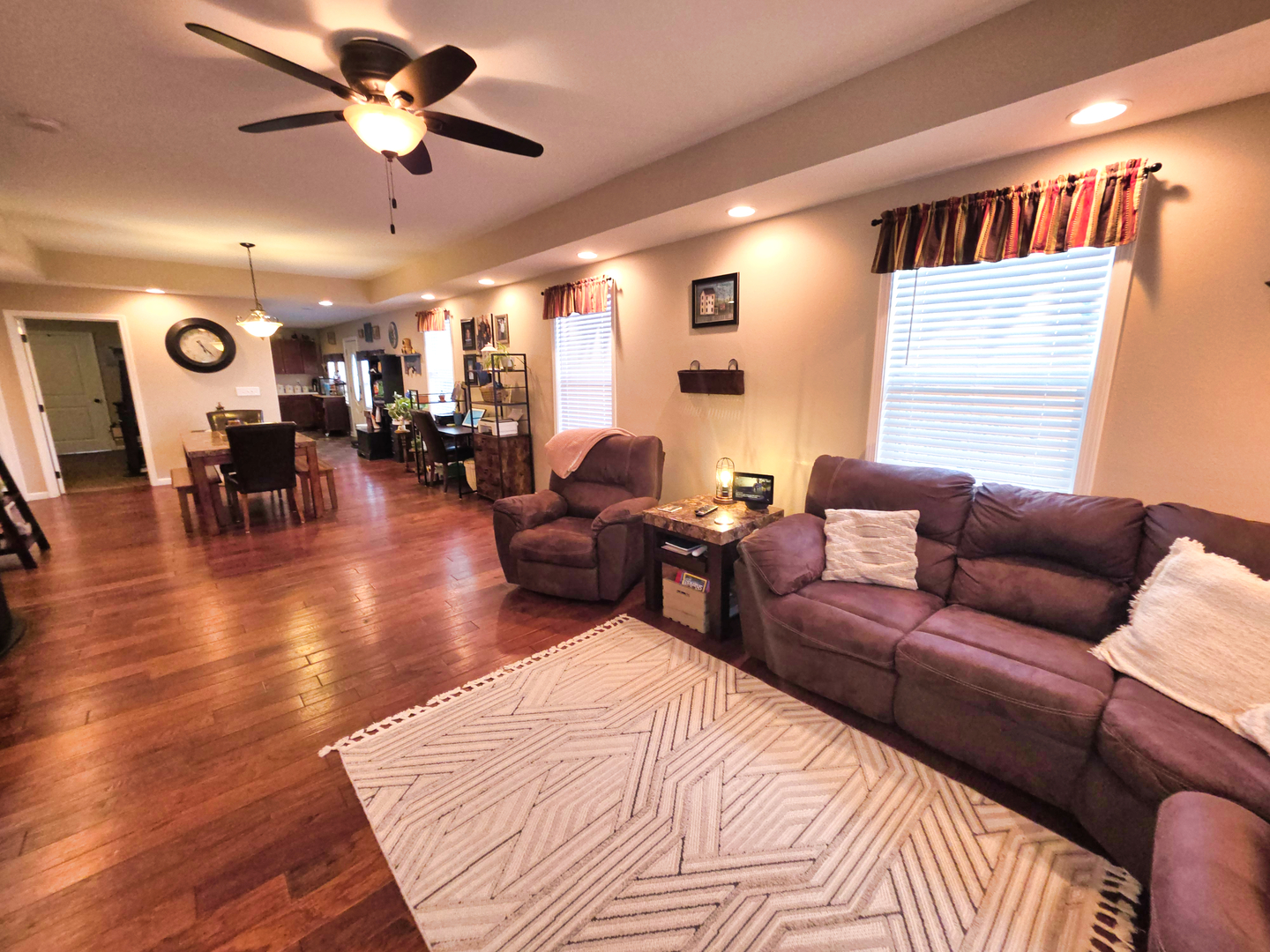127 Flora Avenue Flora, IL 62839 - Photo 30 of 88 a living room with furniture a ceiling fan and a window