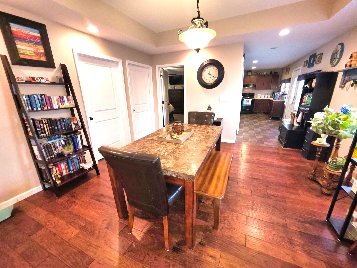 127 Flora Avenue Flora, IL 62839 - Photo 3 of 88 a view of a dining room with furniture and a table