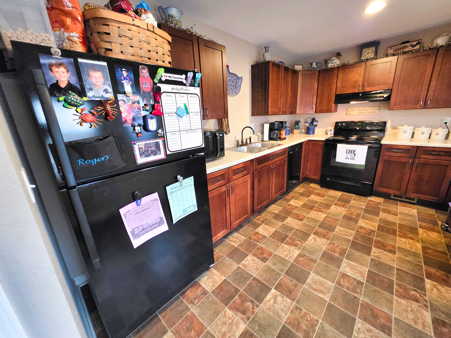 127 Flora Avenue Flora, IL 62839 - Photo 37 of 88 a kitchen with stainless steel appliances granite countertop a refrigerator and a sink