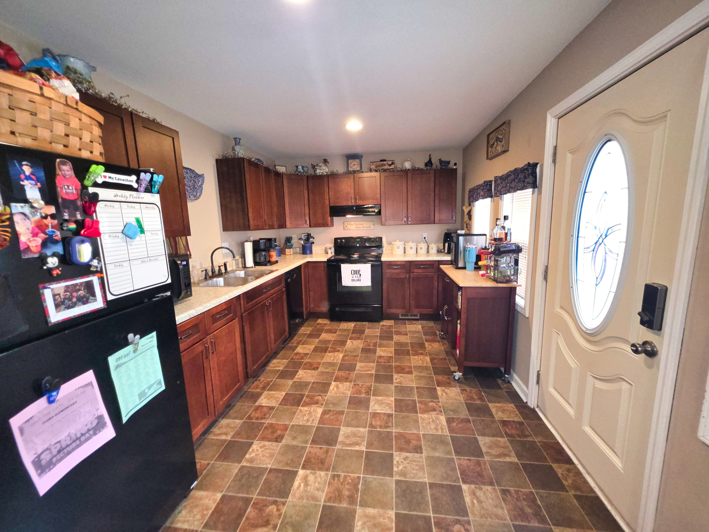 127 Flora Avenue Flora, IL 62839 - Photo 44 of 88 a kitchen with stainless steel appliances granite countertop a sink stove and cabinets