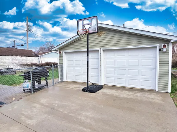 a view of a backyard with a garden