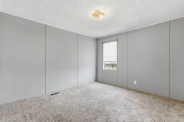 a view of an empty room with window