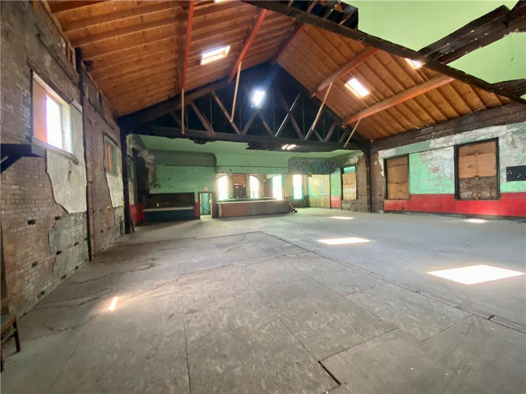 812 Concord Street Pittsburgh, PA 15212 - Photo 12 of 18 a view of an empty room with a fireplace