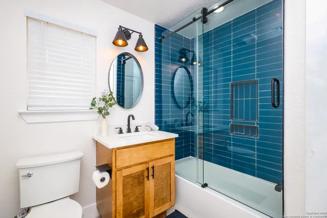 a bed room with a bed and a wooden floor