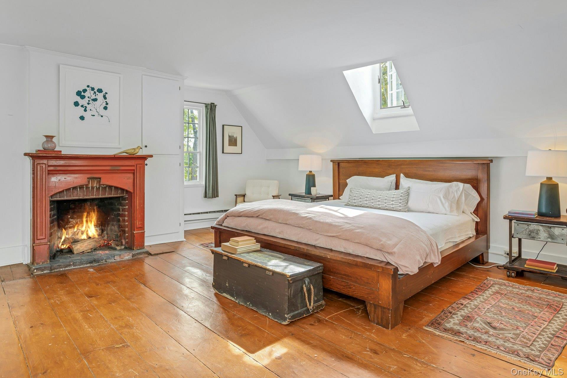 75 Cushman Road Patterson, NY 12563 - Photo 19 of 45 Large primary bedroom w/skylight, large windows and fireplace