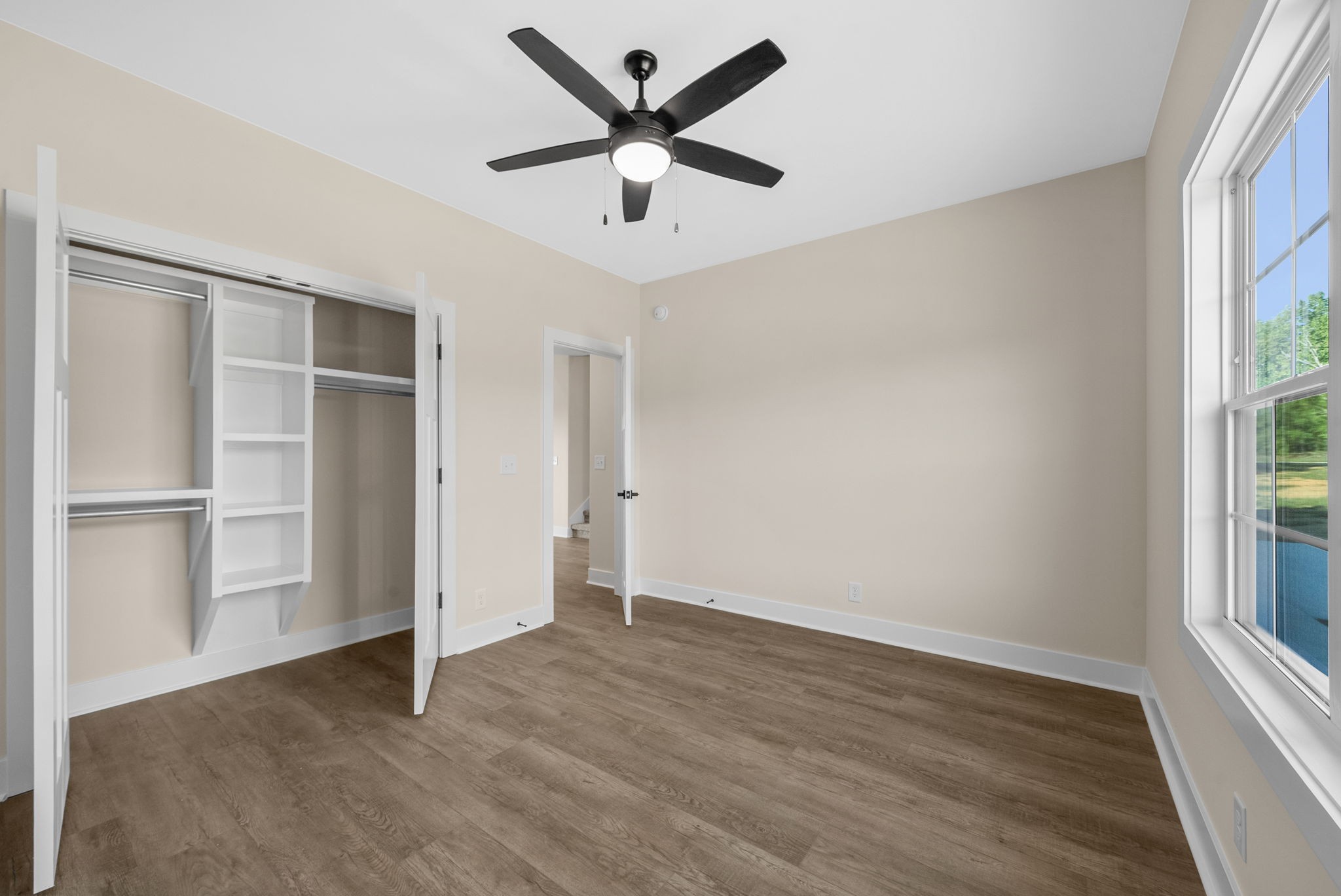 3860 Chapel Hill Road Clarksville, TN 37040 - Photo 24 of 38 wooden floor in an empty room with a window