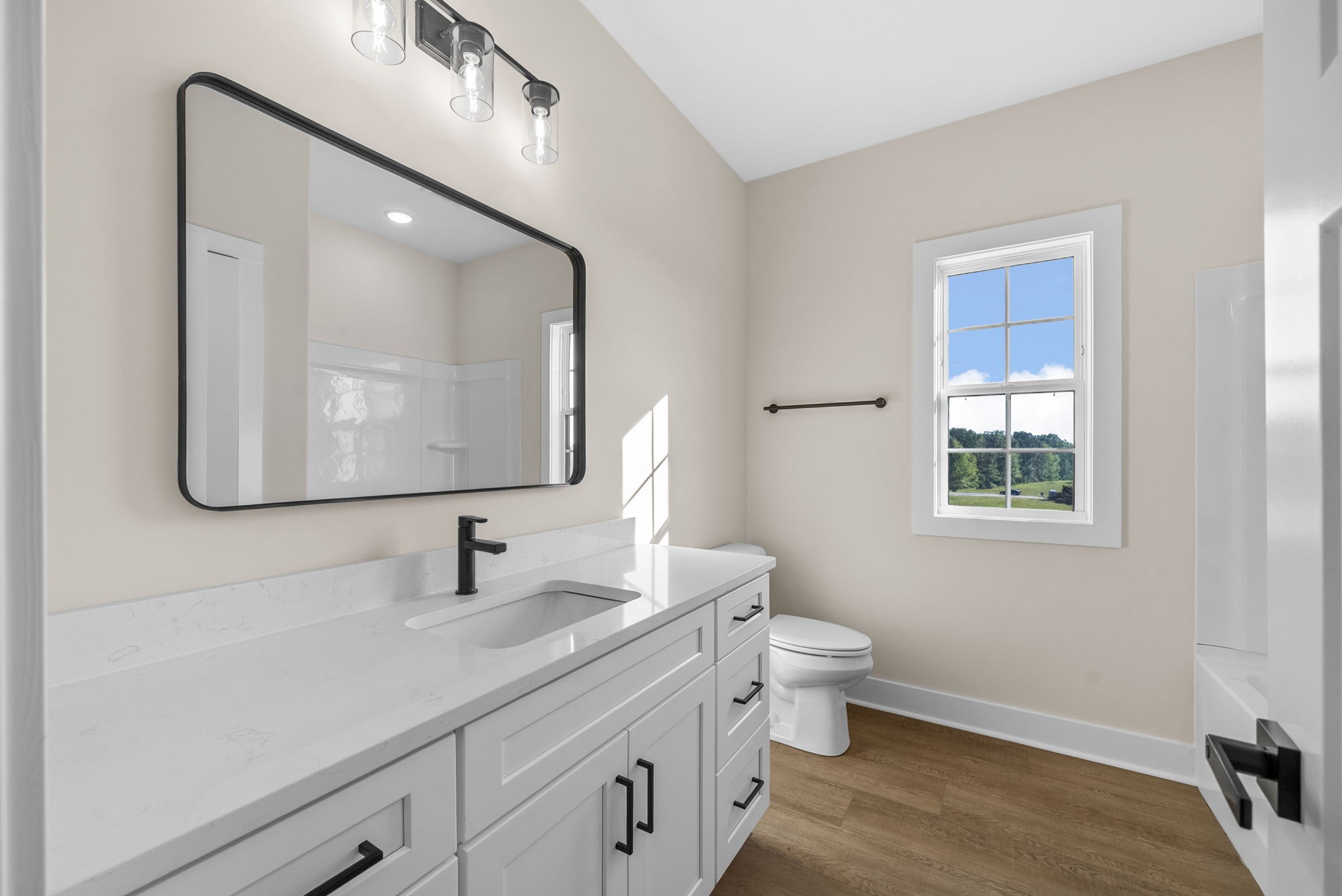 3860 Chapel Hill Road Clarksville, TN 37040 - Photo 25 of 38 a bathroom with a toilet sink and mirror