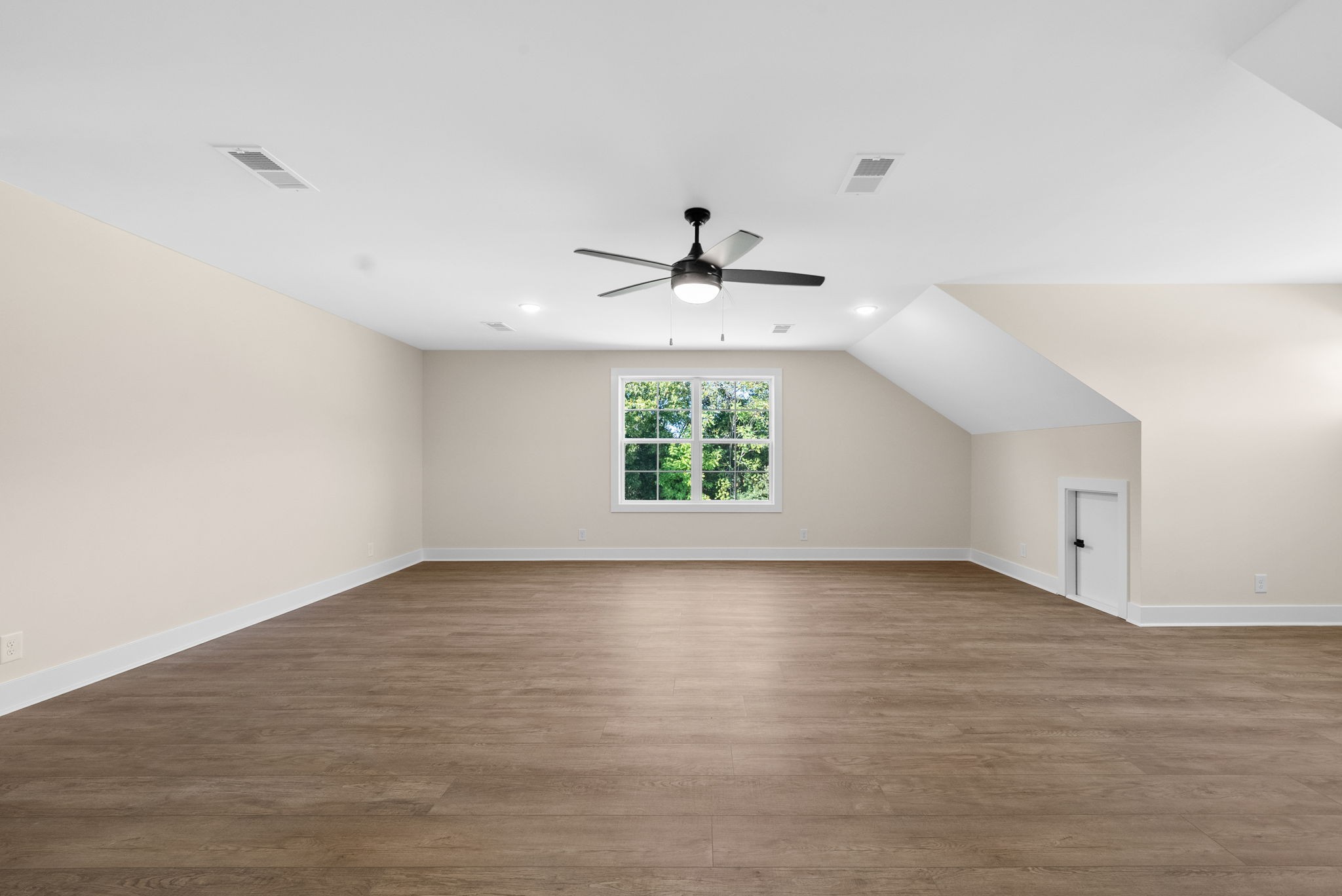 3860 Chapel Hill Road Clarksville, TN 37040 - Photo 30 of 38 wooden floor in an empty room with a window