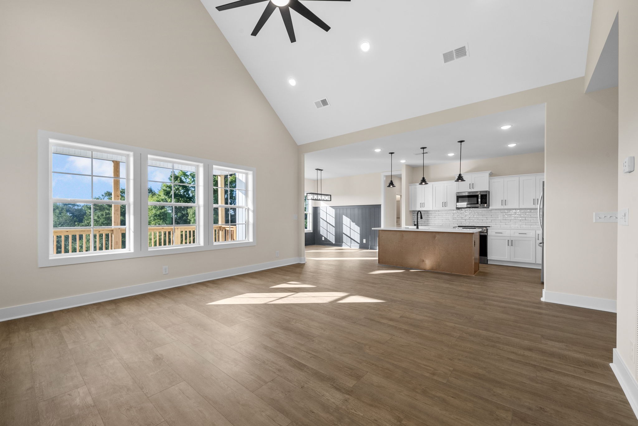 3860 Chapel Hill Road Clarksville, TN 37040 - Photo 33 of 38 a view of an empty room with kitchen and window