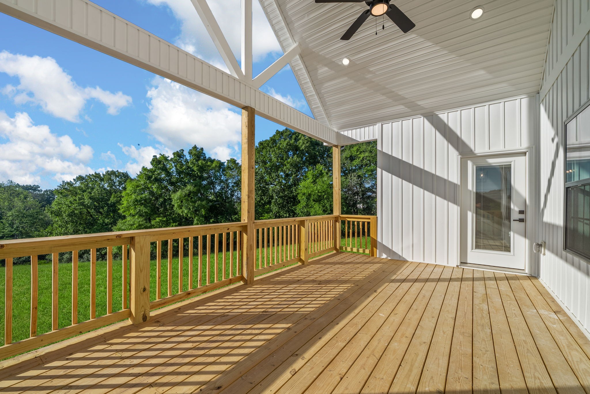 3860 Chapel Hill Road Clarksville, TN 37040 - Photo 36 of 38 a view of deck with wooden floor and iron stairs