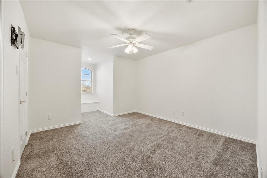 9398 Blarney Stone Way Forney, TX 75126 - Photo 27 of 39 Guest Bedroom Upstairs with Full Bathroom