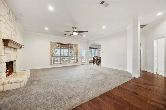 a view of livingroom with hardwood floor and a ceiling fan