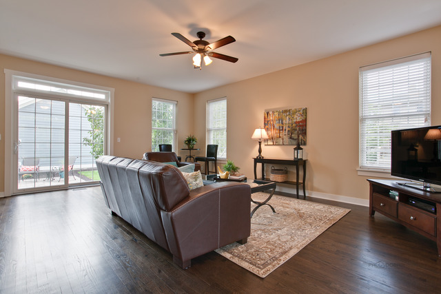 1405 Turks Cap Road Grayslake, IL 60030 - Photo 3 of 25 a living room with furniture wooden floor and a flat screen tv