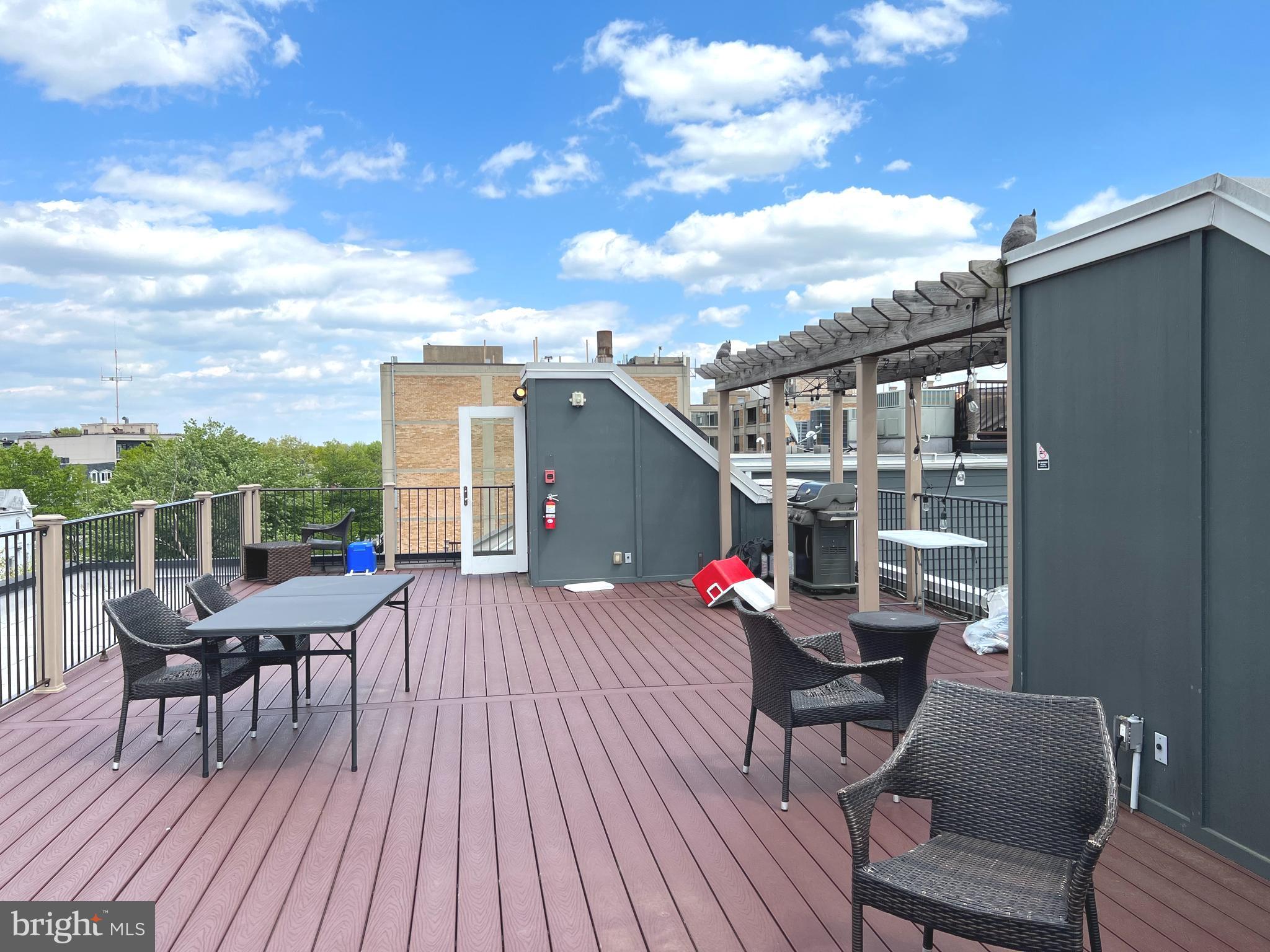 1209 G Street Southeast, Unit 8 Washington, DC 20003 - Photo 26 of 27 a roof deck view with a seating space