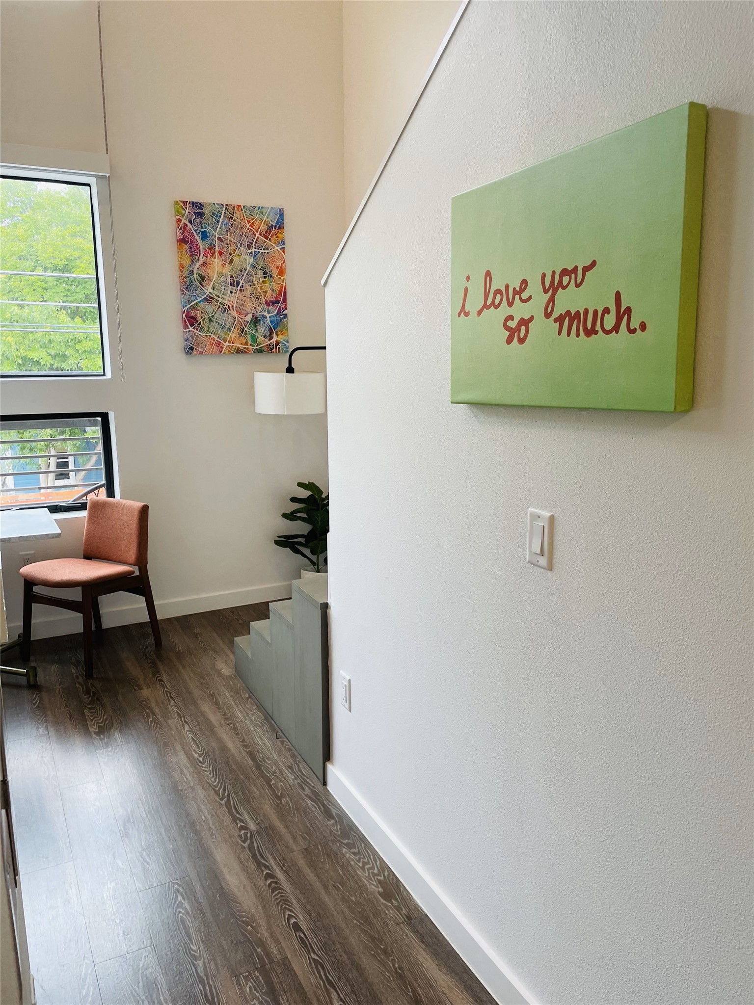 49 Navasota Street, Unit 201 Austin, TX 78702 - Photo 7 of 13 a view of a hallway with wooden floor and a workspace