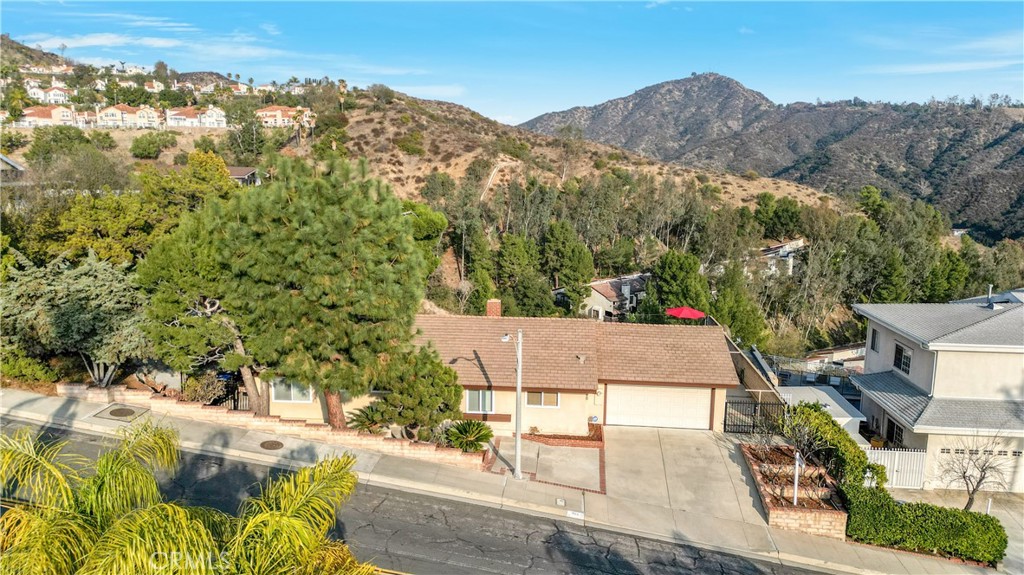 780 Ridge Drive Glendale, CA 91206 - Photo 1 of 55 an aerial view of a house with a yard