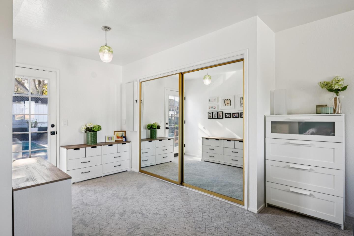 5 Bush Street Monterey, CA 93940 - Photo 22 of 48 a bedroom with a bed and a window