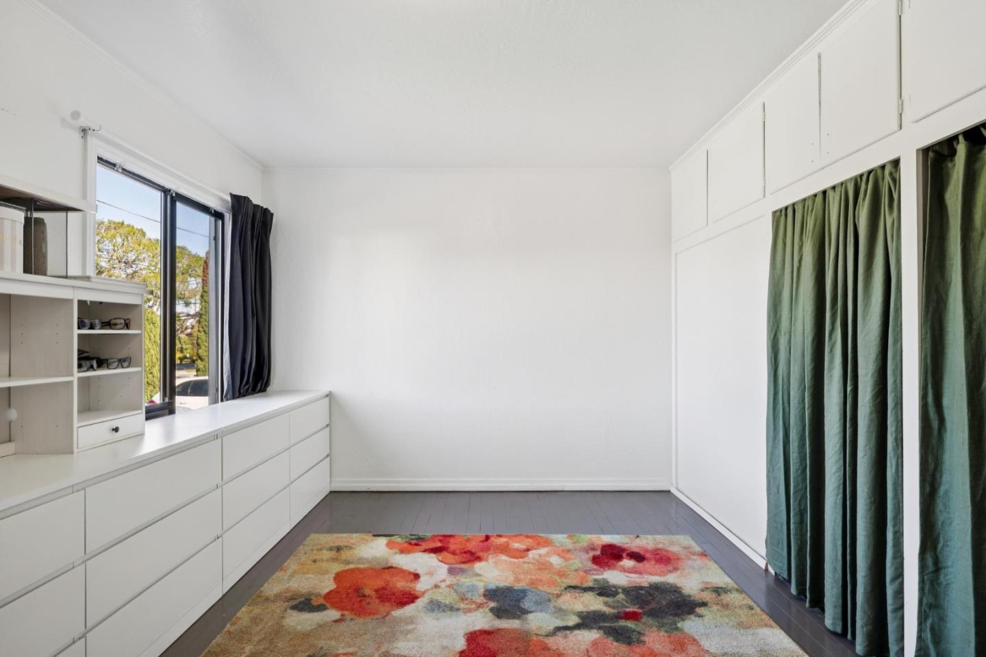 5 Bush Street Monterey, CA 93940 - Photo 31 of 48 a bathroom with a bathtub and a sink