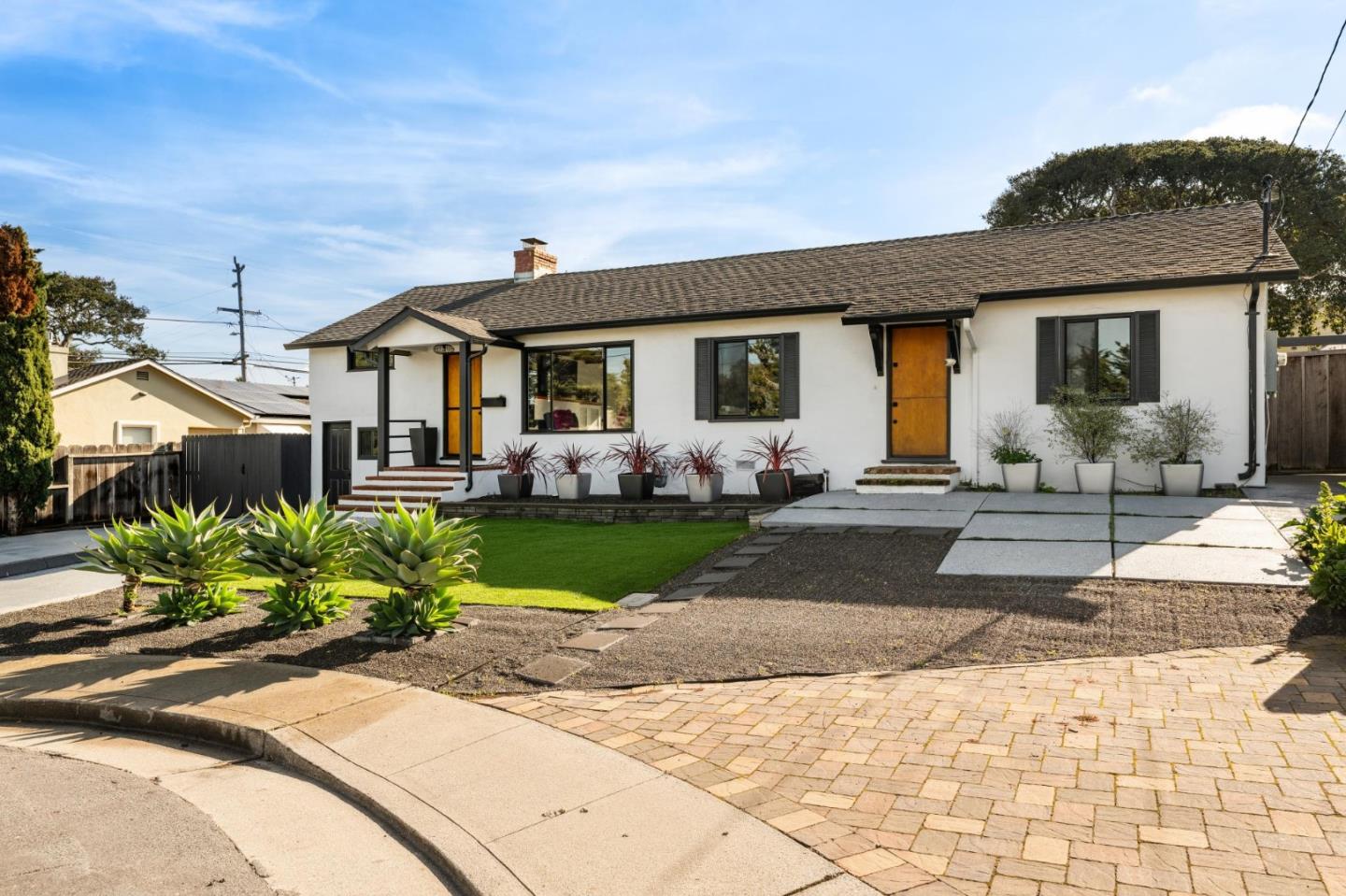 5 Bush Street Monterey, CA 93940 - Photo 4 of 48 a front view of a house with garden