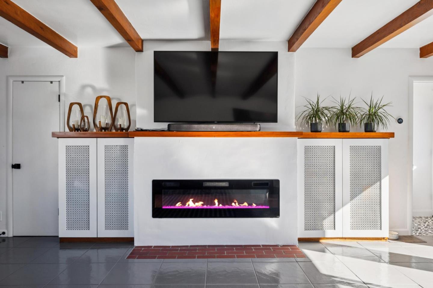 5 Bush Street Monterey, CA 93940 - Photo 9 of 48 a living room with fireplace and a fireplace