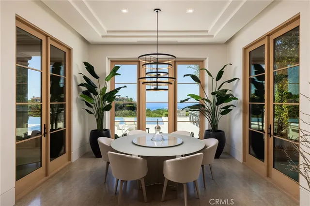 a view of a dining table and chairs in the patio