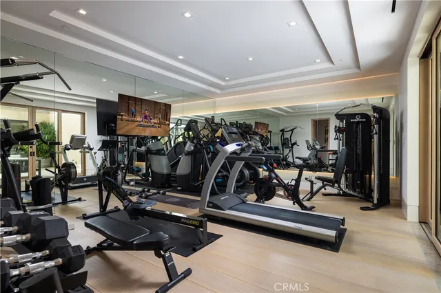 a living room with furniture fireplace and a flat screen tv