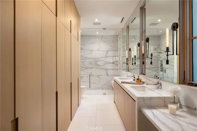 a bathroom with a tub and large window