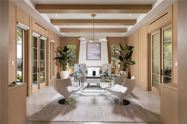 a bathroom with a granite countertop sink a mirror and shower