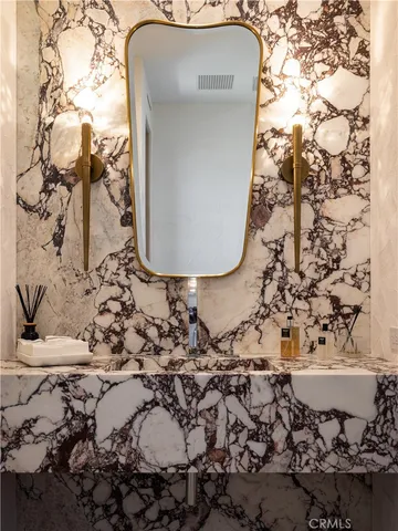 a front view of a house with garden and porch