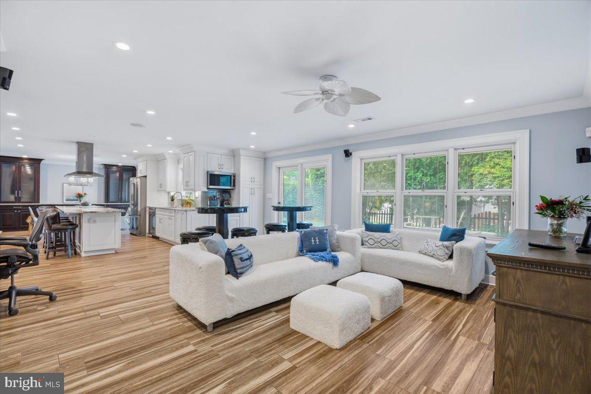 12127 Long Ridge Lane Bowie, MD 20715 - Photo 18 of 46 Family room opens to kitchen w/ back patio access