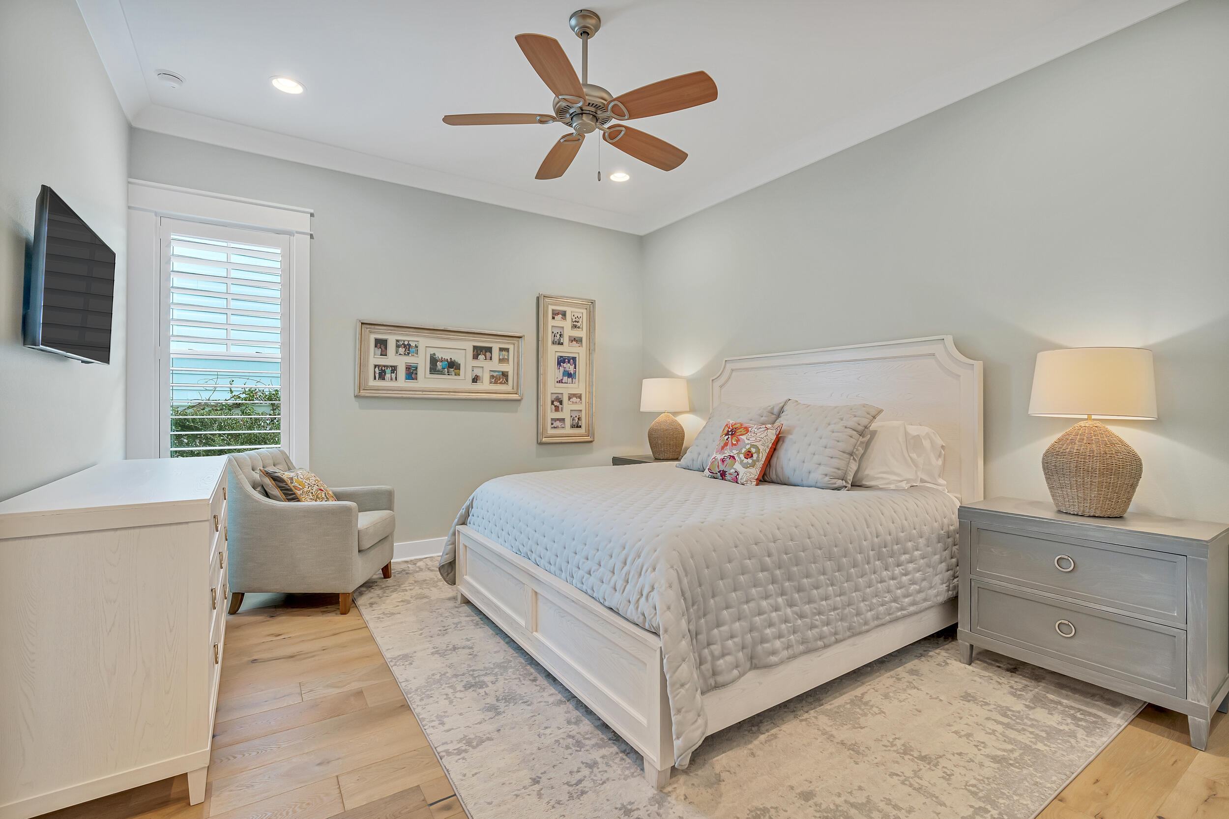 70 Sidecamp Road, Unit LOT 92 Watersound, FL 32461 - Photo 20 of 58 a bedroom with a large bed and two window