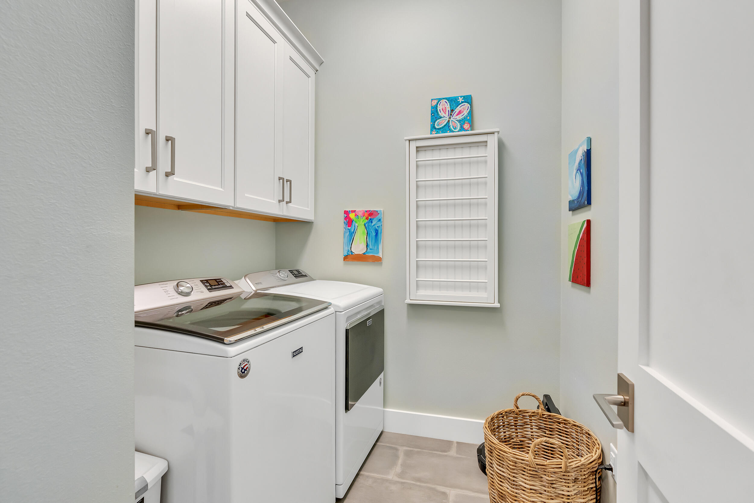 70 Sidecamp Road, Unit LOT 92 Watersound, FL 32461 - Photo 24 of 58 a utility room with dryer and washer