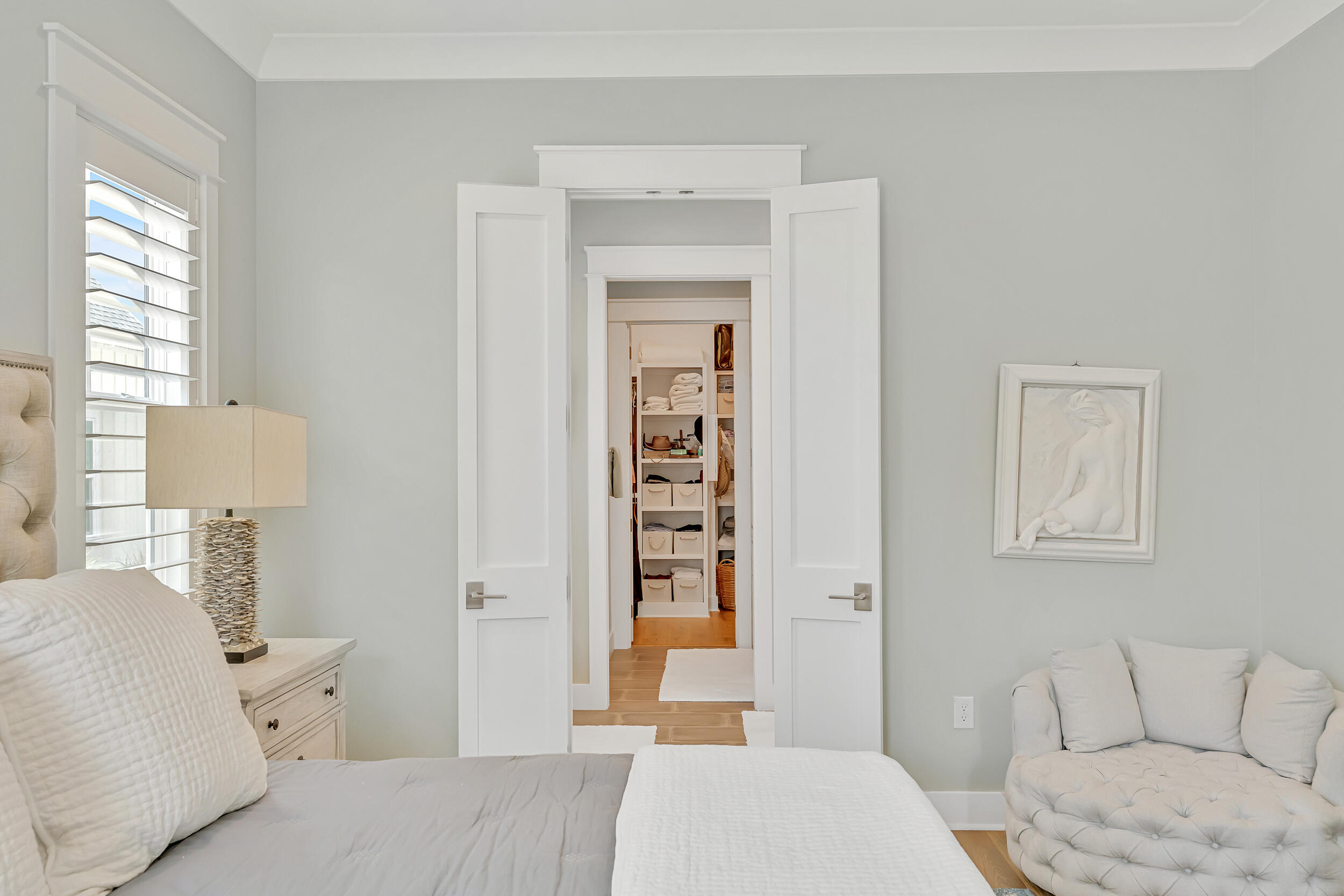 70 Sidecamp Road, Unit LOT 92 Watersound, FL 32461 - Photo 26 of 58 a bedroom with a bed and a couch