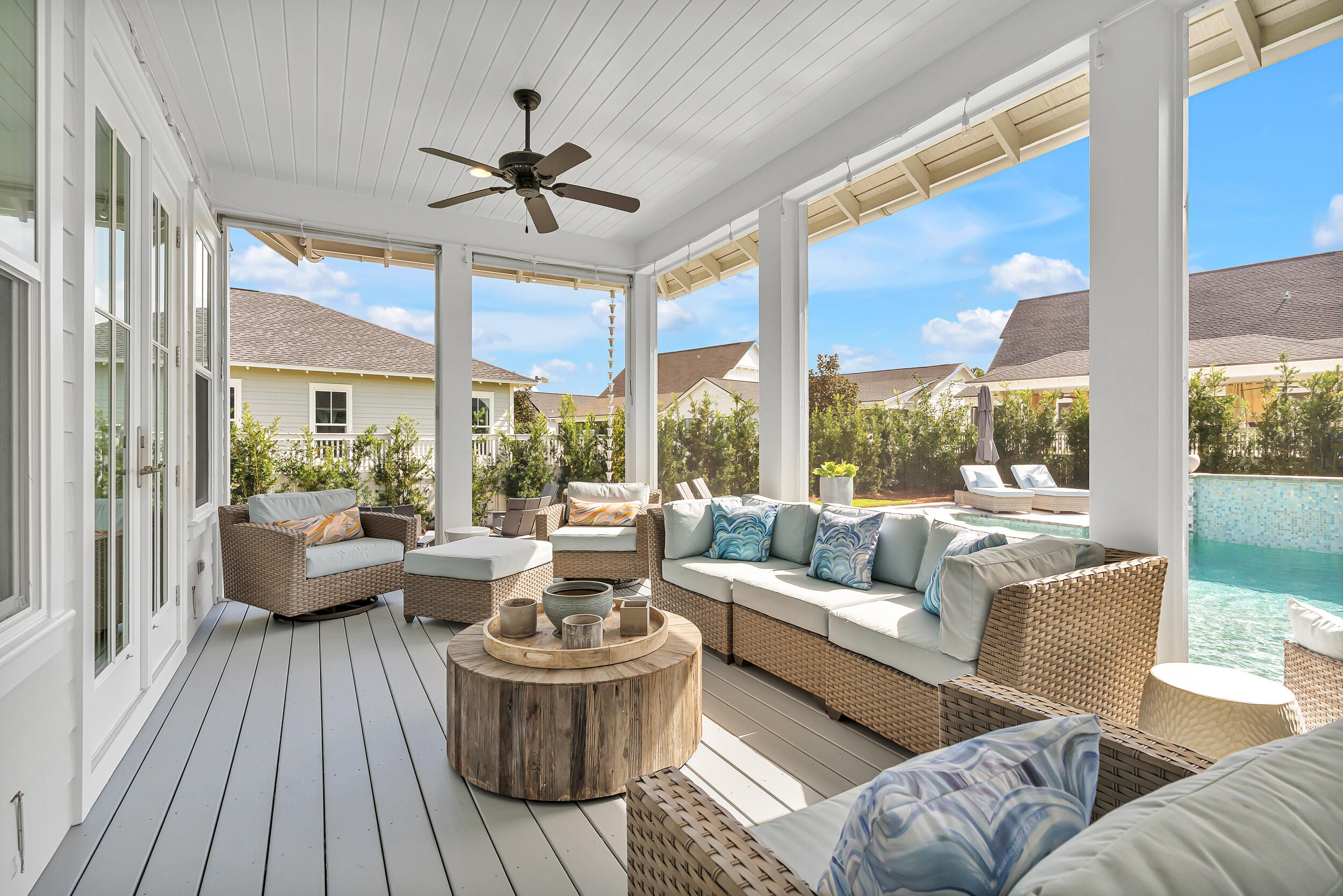 70 Sidecamp Road, Unit LOT 92 Watersound, FL 32461 - Photo 31 of 58 a living room with furniture and a large window